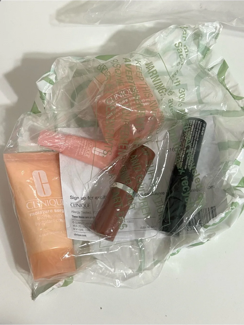 NWT Clinique Makeup Bag with Mousturizer, Lipstick, and Mascara